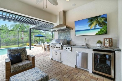 This Stunning home features a Gorgeous heated saltwater pool on The Plantation Golf and Country Club in Florida - for sale on GolfHomes.com, golf home, golf lot