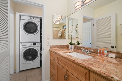 Check out this turnkey Puamana 2 bed, 2 bath end unit with on Makai Golf Club At Princeville in Hawaii - for sale on GolfHomes.com, golf home, golf lot