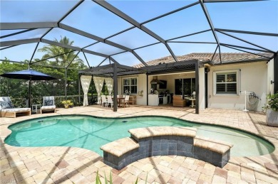 This Stunning home features a Gorgeous heated saltwater pool on The Plantation Golf and Country Club in Florida - for sale on GolfHomes.com, golf home, golf lot