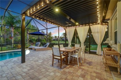This Stunning home features a Gorgeous heated saltwater pool on The Plantation Golf and Country Club in Florida - for sale on GolfHomes.com, golf home, golf lot
