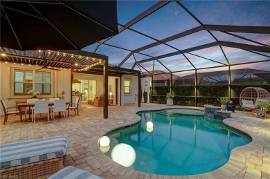 This Stunning home features a Gorgeous heated saltwater pool on The Plantation Golf and Country Club in Florida - for sale on GolfHomes.com, golf home, golf lot