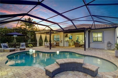 This Stunning home features a Gorgeous heated saltwater pool on The Plantation Golf and Country Club in Florida - for sale on GolfHomes.com, golf home, golf lot