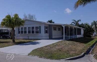 Meticulously restored home with state of the art kitchen. This on Spanish Lakes I in Florida - for sale on GolfHomes.com, golf home, golf lot
