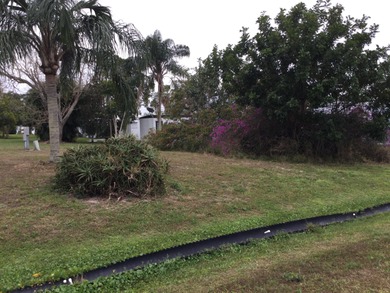 Meticulously restored home with state of the art kitchen.  This on Spanish Lakes I in Florida - for sale on GolfHomes.com, golf home, golf lot