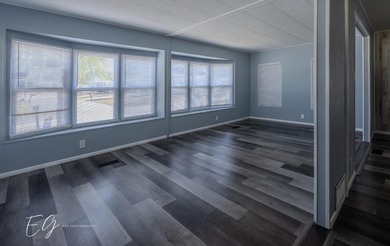 Meticulously restored home with state of the art kitchen. This on Spanish Lakes I in Florida - for sale on GolfHomes.com, golf home, golf lot