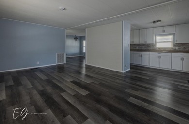 Meticulously restored home with state of the art kitchen. This on Spanish Lakes I in Florida - for sale on GolfHomes.com, golf home, golf lot