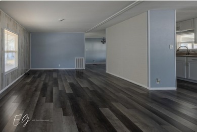 Meticulously restored home with state of the art kitchen. This on Spanish Lakes I in Florida - for sale on GolfHomes.com, golf home, golf lot