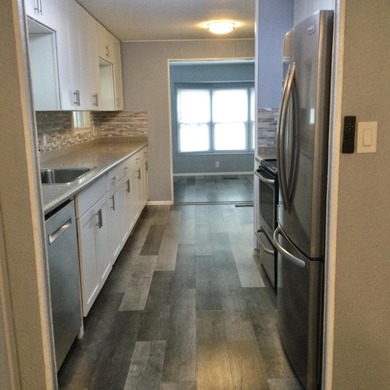 Meticulously restored home with state of the art kitchen.  This on Spanish Lakes I in Florida - for sale on GolfHomes.com, golf home, golf lot