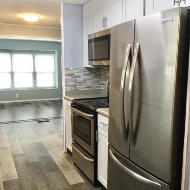 Meticulously restored home with state of the art kitchen.  This on Spanish Lakes I in Florida - for sale on GolfHomes.com, golf home, golf lot