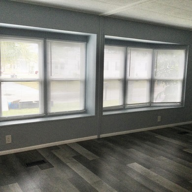 Meticulously restored home with state of the art kitchen.  This on Spanish Lakes I in Florida - for sale on GolfHomes.com, golf home, golf lot