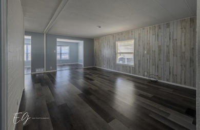 Meticulously restored home with state of the art kitchen. This on Spanish Lakes I in Florida - for sale on GolfHomes.com, golf home, golf lot