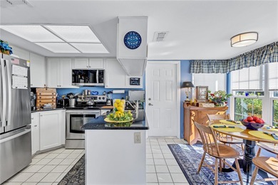 Welcome to this stunning two bedroom two bath villa nestled in a on Highland Lakes Executive Golf Course in Florida - for sale on GolfHomes.com, golf home, golf lot