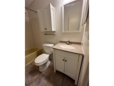 2 bed | 2 bath | 864 sq ft - Handyman's Special in Highly on Lake Henry Golf Club in Florida - for sale on GolfHomes.com, golf home, golf lot