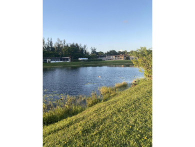 This villa has been completely renovated. It has been remodeled on Mayacoo Lakes Country Club in Florida - for sale on GolfHomes.com, golf home, golf lot