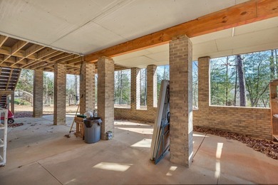 Welcome to 116 Augusta National, a beautiful home nestled within on Cobbs Glen Country Club in South Carolina - for sale on GolfHomes.com, golf home, golf lot