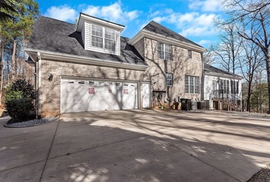 Welcome to 116 Augusta National, a beautiful home nestled within on Cobbs Glen Country Club in South Carolina - for sale on GolfHomes.com, golf home, golf lot
