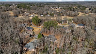 Welcome to 116 Augusta National, a beautiful home nestled within on Cobbs Glen Country Club in South Carolina - for sale on GolfHomes.com, golf home, golf lot
