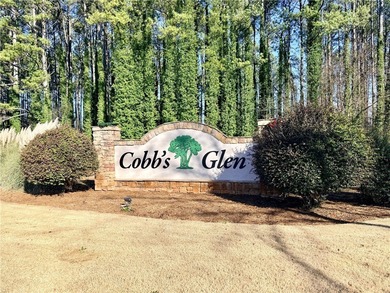 Welcome to 116 Augusta National, a beautiful home nestled within on Cobbs Glen Country Club in South Carolina - for sale on GolfHomes.com, golf home, golf lot