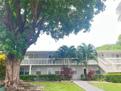 OK TO FINANCE IN THIS BUILDING *****SECOND FLOOR  UNIT. There is on Hillsboro Pines Golf in Florida - for sale on GolfHomes.com, golf home, golf lot