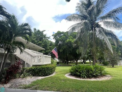 OK TO FINANCE IN THIS BUILDING *****SECOND FLOOR  UNIT. There is on Hillsboro Pines Golf in Florida - for sale on GolfHomes.com, golf home, golf lot