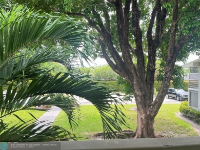 OK TO FINANCE IN THIS BUILDING *****SECOND FLOOR  UNIT. There is on Hillsboro Pines Golf in Florida - for sale on GolfHomes.com, golf home, golf lot