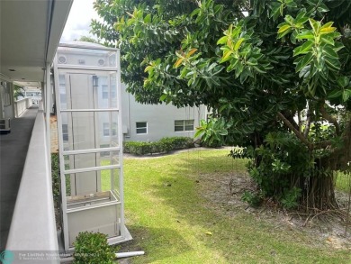 OK TO FINANCE IN THIS BUILDING *****SECOND FLOOR  UNIT. There is on Hillsboro Pines Golf in Florida - for sale on GolfHomes.com, golf home, golf lot