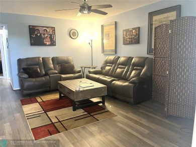 OK TO FINANCE IN THIS BUILDING *****SECOND FLOOR  UNIT. There is on Hillsboro Pines Golf in Florida - for sale on GolfHomes.com, golf home, golf lot