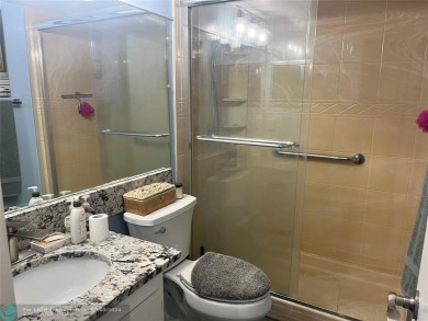 OK TO FINANCE IN THIS BUILDING *****SECOND FLOOR  UNIT. There is on Hillsboro Pines Golf in Florida - for sale on GolfHomes.com, golf home, golf lot
