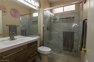 394 Gatlinburg Ct is a luxury residence located on a cul-de-sac on Dragon Ridge Country Club in Nevada - for sale on GolfHomes.com, golf home, golf lot