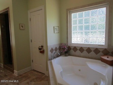 Beautiful Home and yard for Sale in Albemarle Plantation, a on Sound Golf Links at Albemarle Plantation in North Carolina - for sale on GolfHomes.com, golf home, golf lot