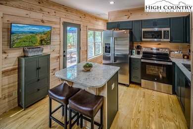 GREAT PRICE - RENTAL READY! Outstanding Log Cabin in Prime Beech on Beech Mountain Club in North Carolina - for sale on GolfHomes.com, golf home, golf lot