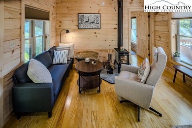 GREAT PRICE - RENTAL READY! Outstanding Log Cabin in Prime Beech on Beech Mountain Club in North Carolina - for sale on GolfHomes.com, golf home, golf lot