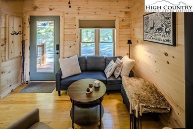 GREAT PRICE - RENTAL READY! Outstanding Log Cabin in Prime Beech on Beech Mountain Club in North Carolina - for sale on GolfHomes.com, golf home, golf lot