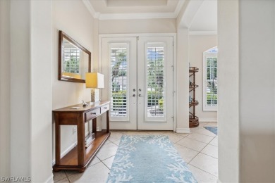 This gorgeous, updated home offers an expansive view of the lake on Gateway Golf and Country Club in Florida - for sale on GolfHomes.com, golf home, golf lot