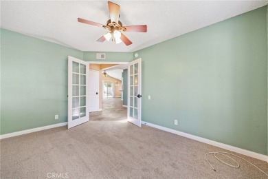 Welcome to this beautiful, single-story, home nestled in the on Menifee Lakes Country Club - Lakes in California - for sale on GolfHomes.com, golf home, golf lot