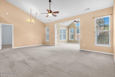 Welcome to 501 Sandpiper Bay SW, a beautifully maintained on Sandpiper Bay Golf and Country Club in North Carolina - for sale on GolfHomes.com, golf home, golf lot