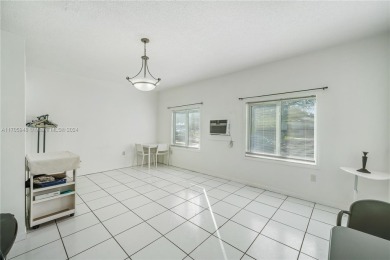 Discover this rare gem in the heart of the charming City of on Miami Springs Golf and Country Club in Florida - for sale on GolfHomes.com, golf home, golf lot