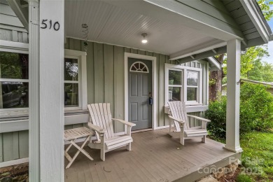 Views of Lake Tomahawk! This charming 2-bedroom/1-bath cottage on Black Mountain Golf Course in North Carolina - for sale on GolfHomes.com, golf home, golf lot