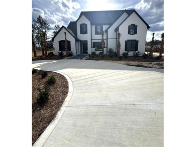 Welcome to 20 Club Drive in Jesup, a stunning luxury residence on Pine Forest Country Club in Georgia - for sale on GolfHomes.com, golf home, golf lot