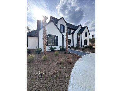 Welcome to 20 Club Drive in Jesup, a stunning luxury residence on Pine Forest Country Club in Georgia - for sale on GolfHomes.com, golf home, golf lot