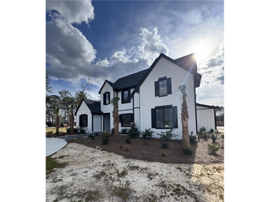 Welcome to 20 Club Drive in Jesup, a stunning luxury residence on Pine Forest Country Club in Georgia - for sale on GolfHomes.com, golf home, golf lot