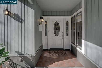 This reconfigured end unit Carmel features two bedrooms and two on Rossmoor Golf Course in California - for sale on GolfHomes.com, golf home, golf lot