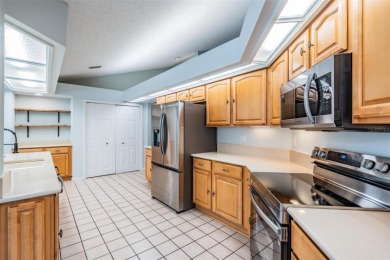 Single-Story 5-Bedroom Pool Home in Hunter's Green Golf on Hunters Green Country Club in Florida - for sale on GolfHomes.com, golf home, golf lot