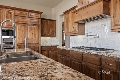 Envelop yourself in luxury. Located in the beautiful gated on Falcon Ridge Golf Course in Nevada - for sale on GolfHomes.com, golf home, golf lot