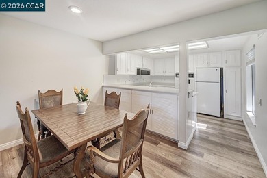 This reconfigured end unit Carmel features two bedrooms and two on Rossmoor Golf Course in California - for sale on GolfHomes.com, golf home, golf lot