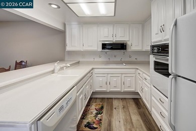 This reconfigured end unit Carmel features two bedrooms and two on Rossmoor Golf Course in California - for sale on GolfHomes.com, golf home, golf lot