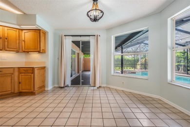 Single-Story 5-Bedroom Pool Home in Hunter's Green Golf on Hunters Green Country Club in Florida - for sale on GolfHomes.com, golf home, golf lot