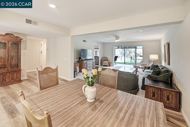 This reconfigured end unit Carmel features two bedrooms and two on Rossmoor Golf Course in California - for sale on GolfHomes.com, golf home, golf lot