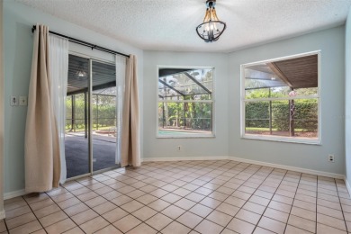 Single-Story 5-Bedroom Pool Home in Hunter's Green Golf on Hunters Green Country Club in Florida - for sale on GolfHomes.com, golf home, golf lot