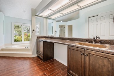 Single-Story 5-Bedroom Pool Home in Hunter's Green Golf on Hunters Green Country Club in Florida - for sale on GolfHomes.com, golf home, golf lot